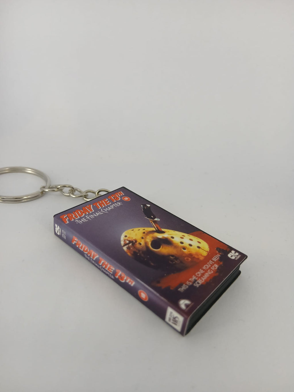 Friday the 13th The Final Chapter VHS keyring — front cover with 1p coin for scale