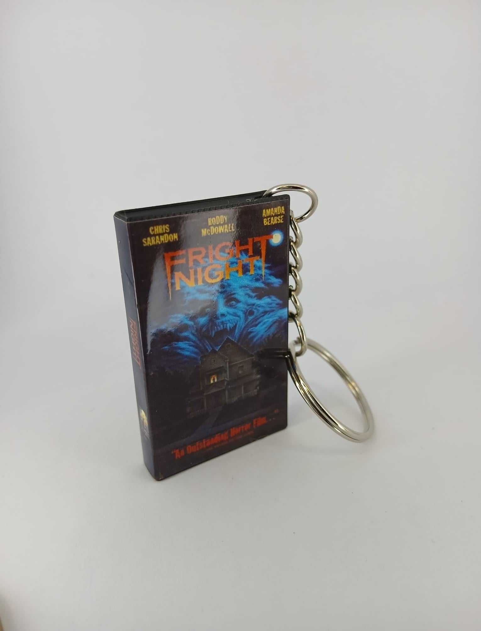 Fright Night VHS keyring — flat lay front and back angled
