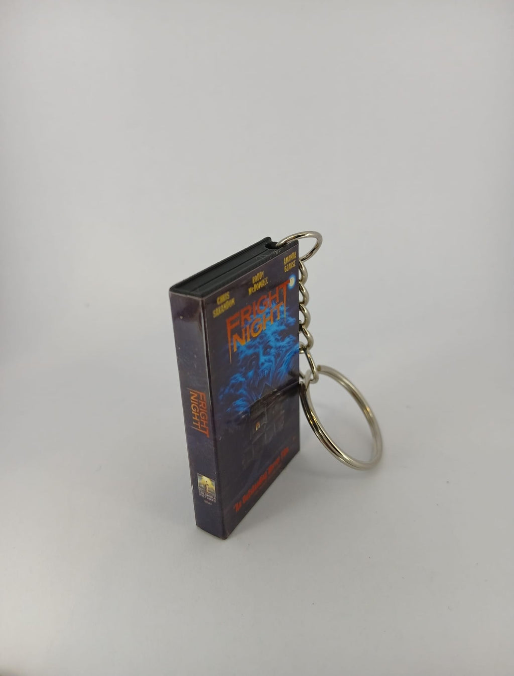 Fright Night VHS keyring — back cover standing angled 2