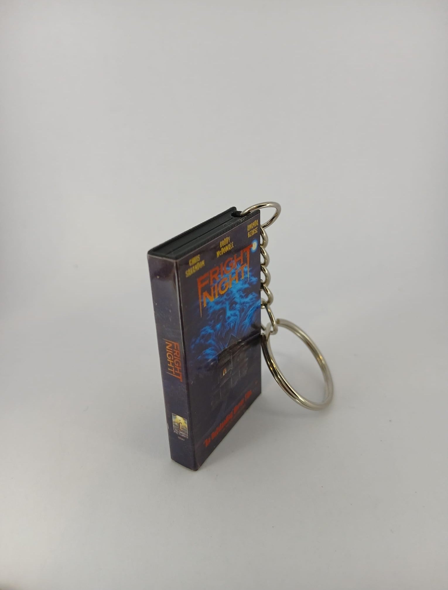 Fright Night VHS keyring — back cover standing angled 2