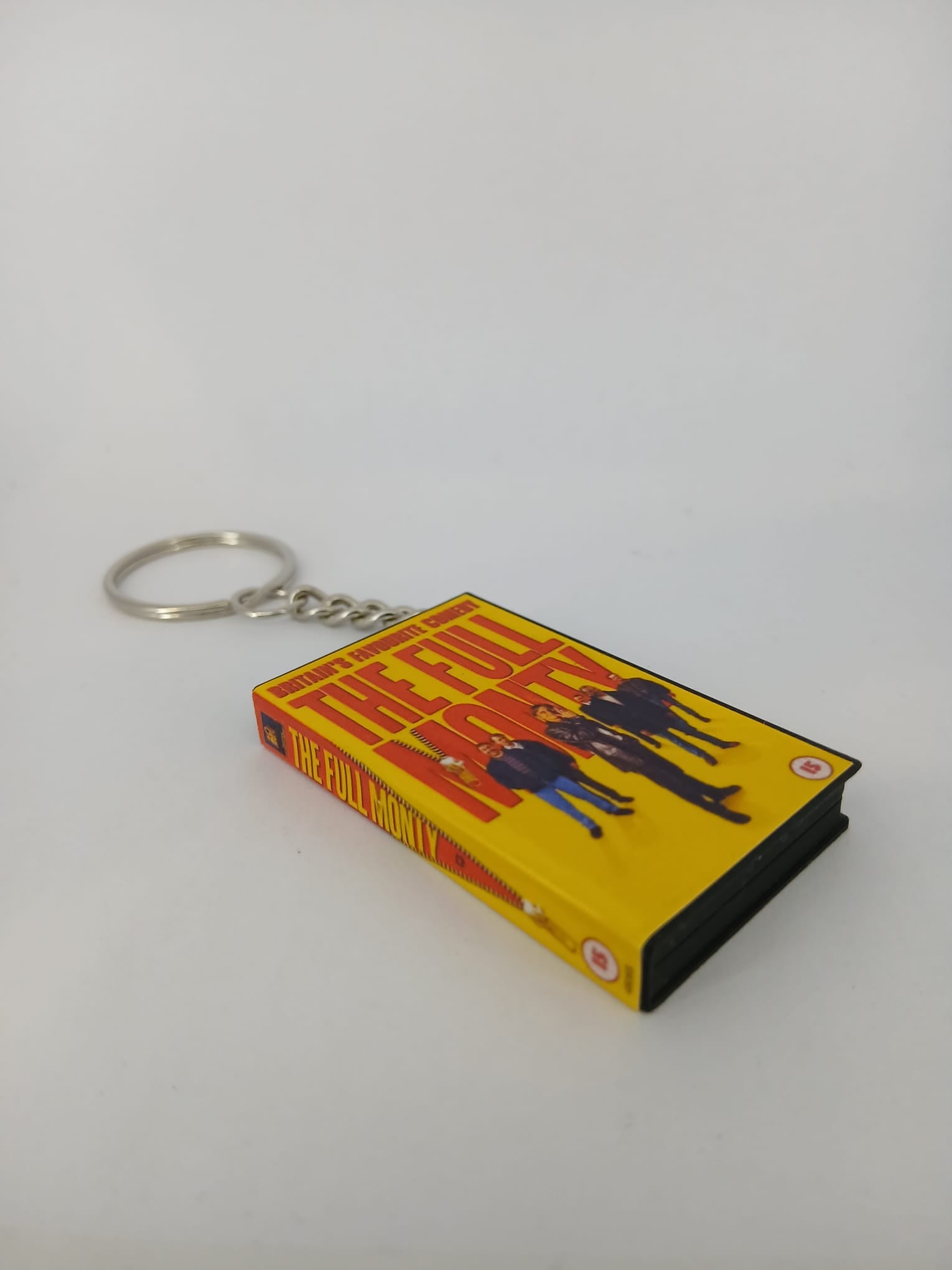 The Full Monty VHS keyring — back cover standing angled 2