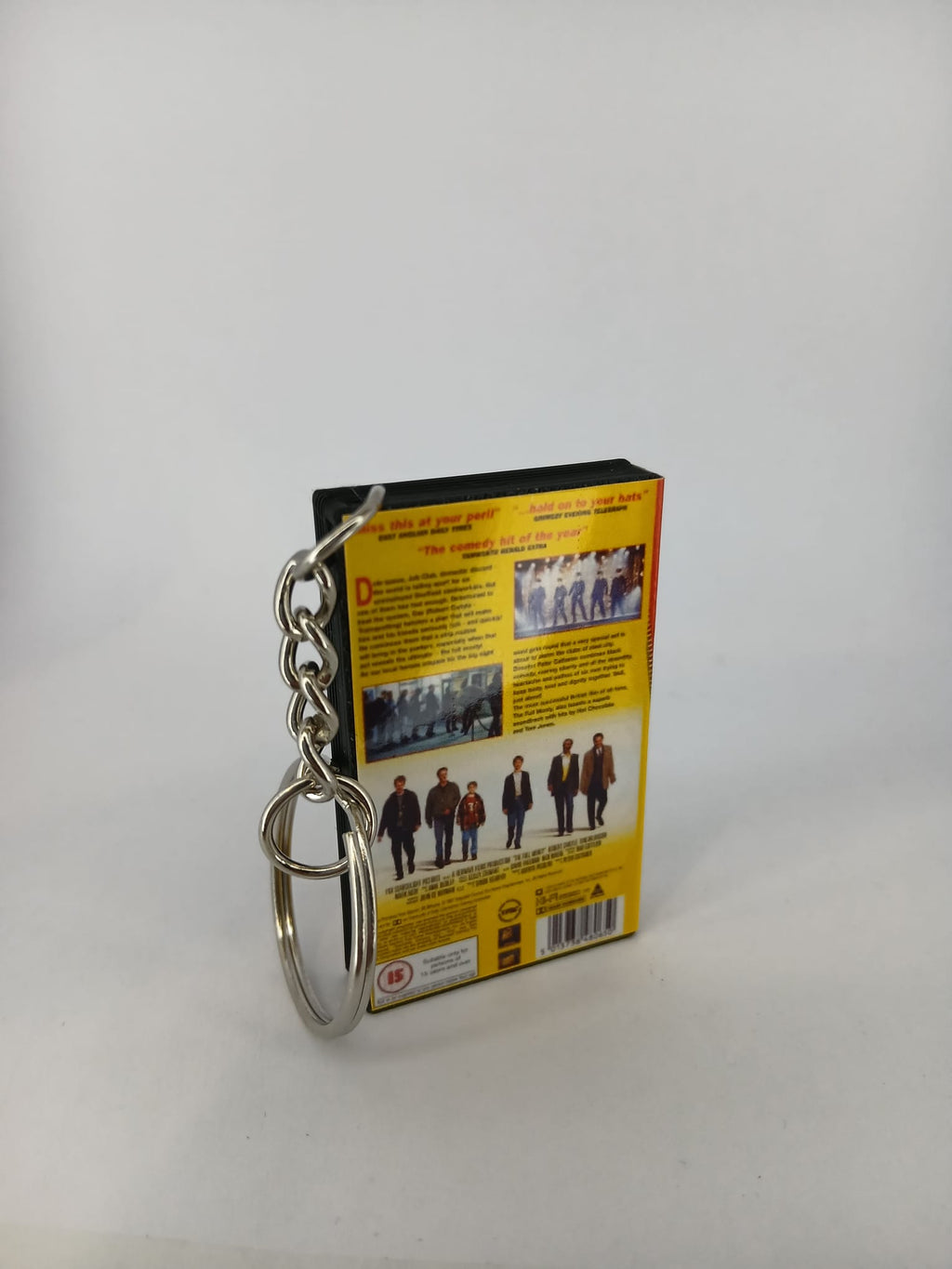 The Full Monty VHS keyring — front cover standing angled