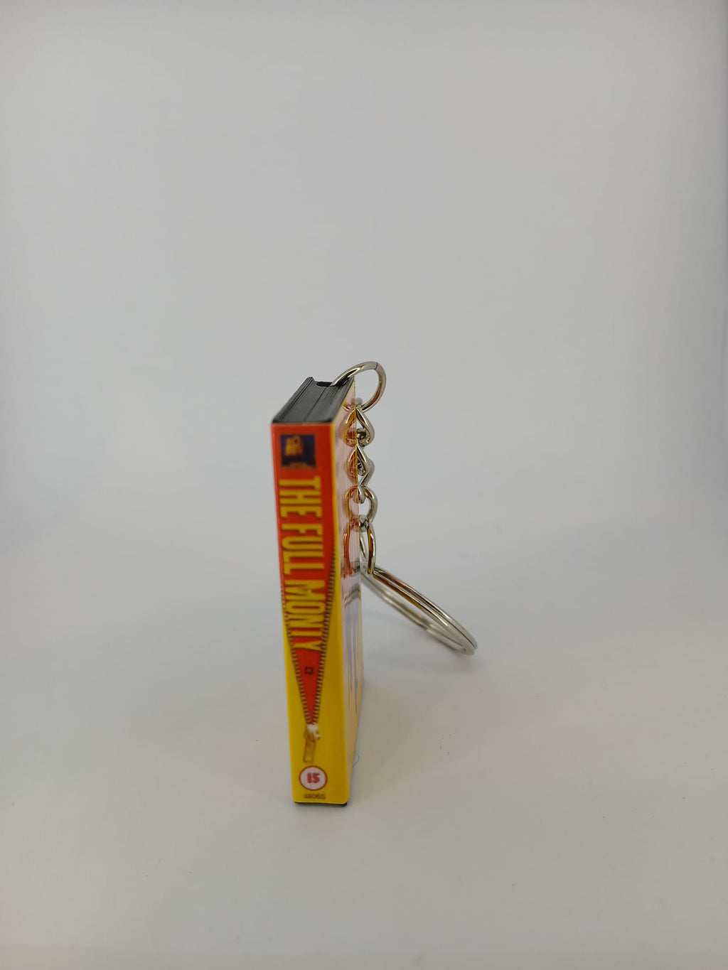 The Full Monty VHS keyring — front cover standing angled 2