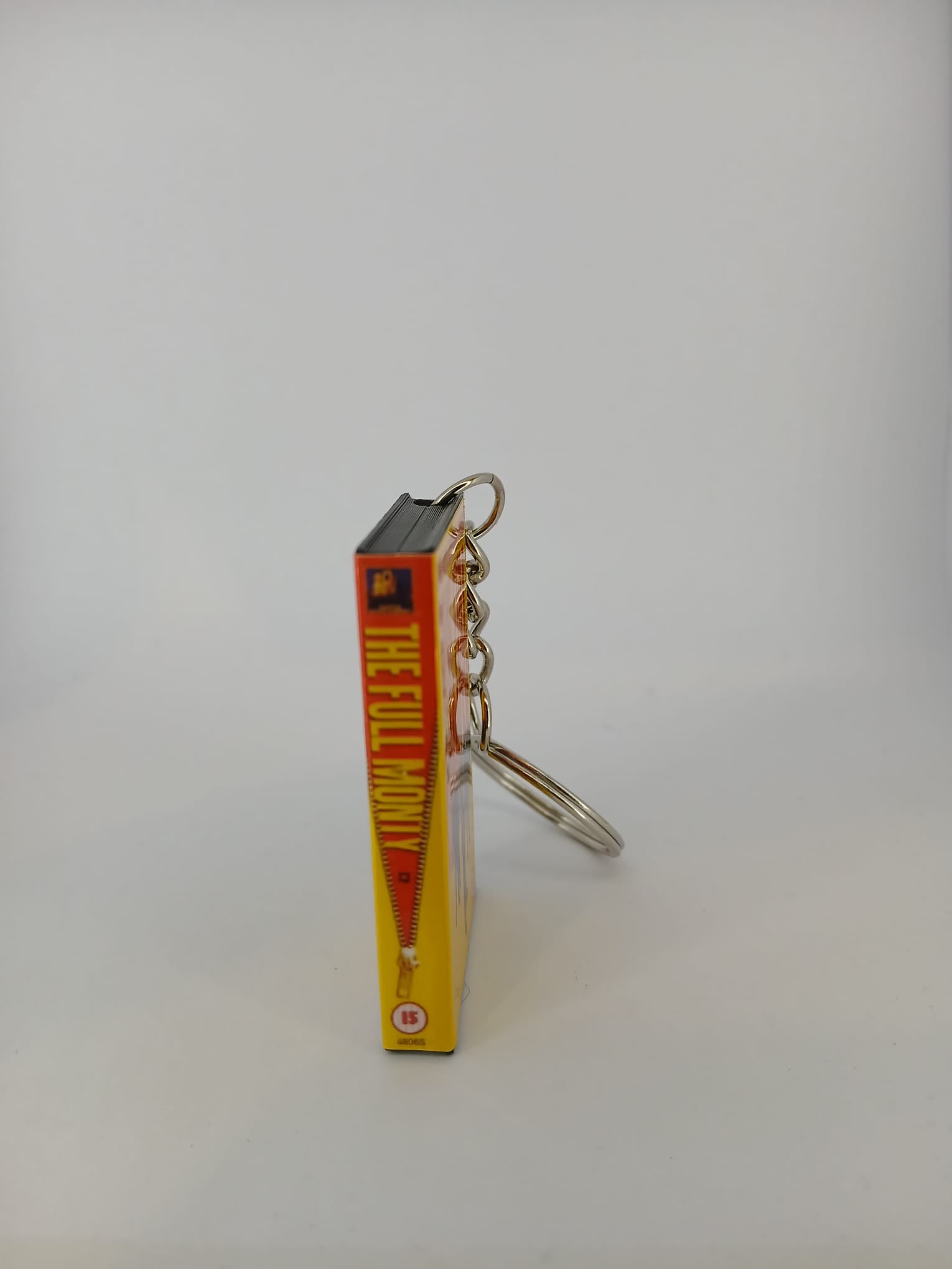 The Full Monty VHS keyring — front cover standing angled 2