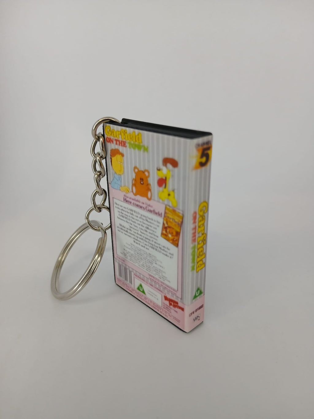 Garfield on the Town VHS keyring — back cover angled view standing