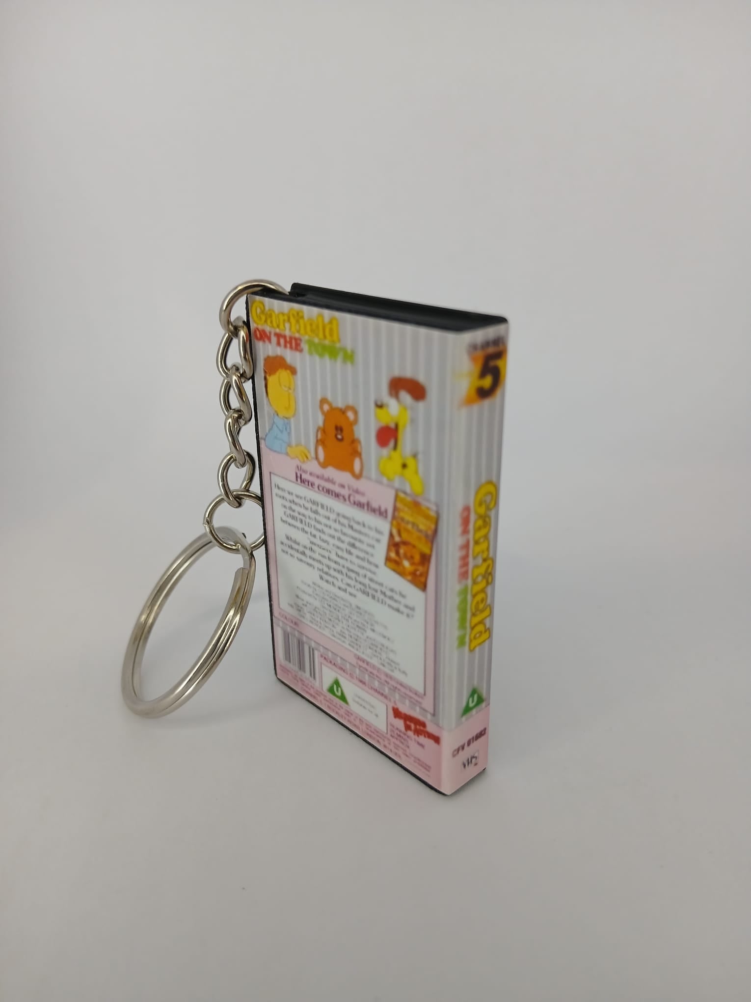 Garfield on the Town VHS keyring — back cover angled view standing
