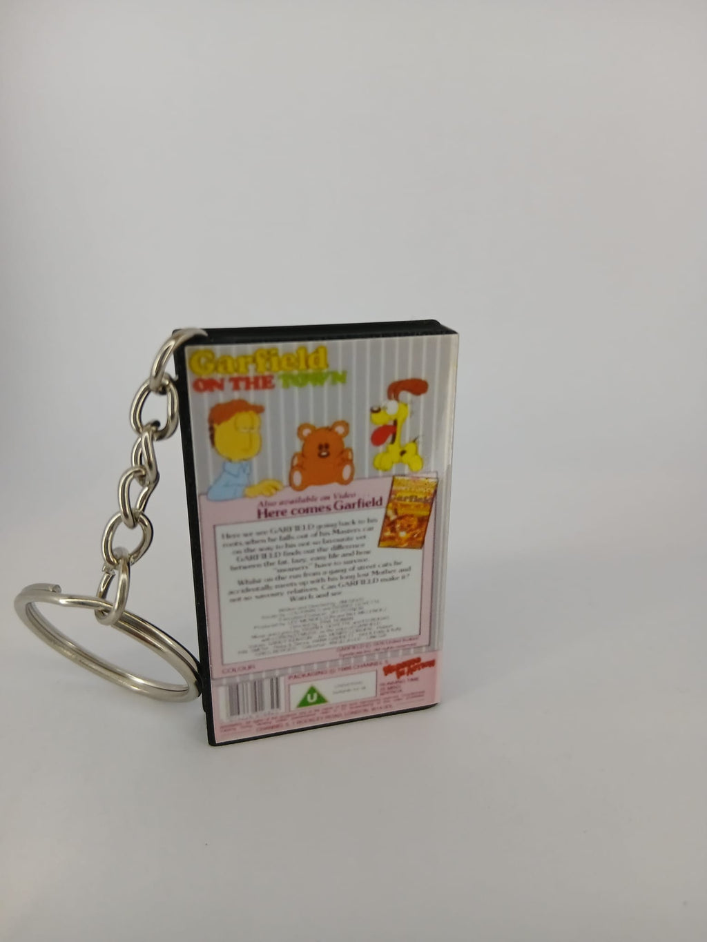 Garfield on the Town VHS keyring — spine view standing