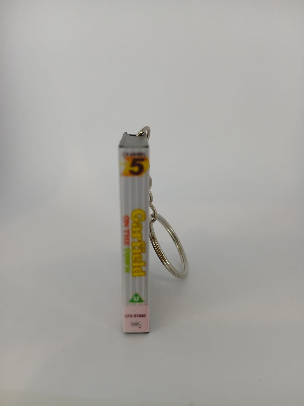 Garfield on the Town VHS keyring — front cover standing angled
