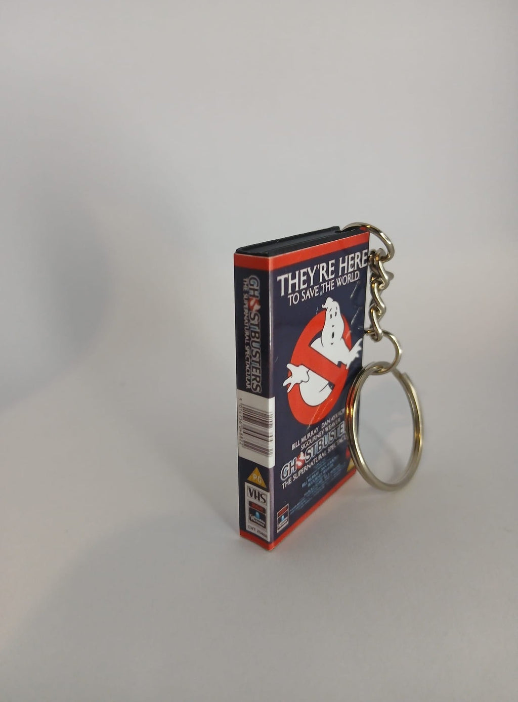 Ghostbusters Mini VHS Keyring – front with coin standing
