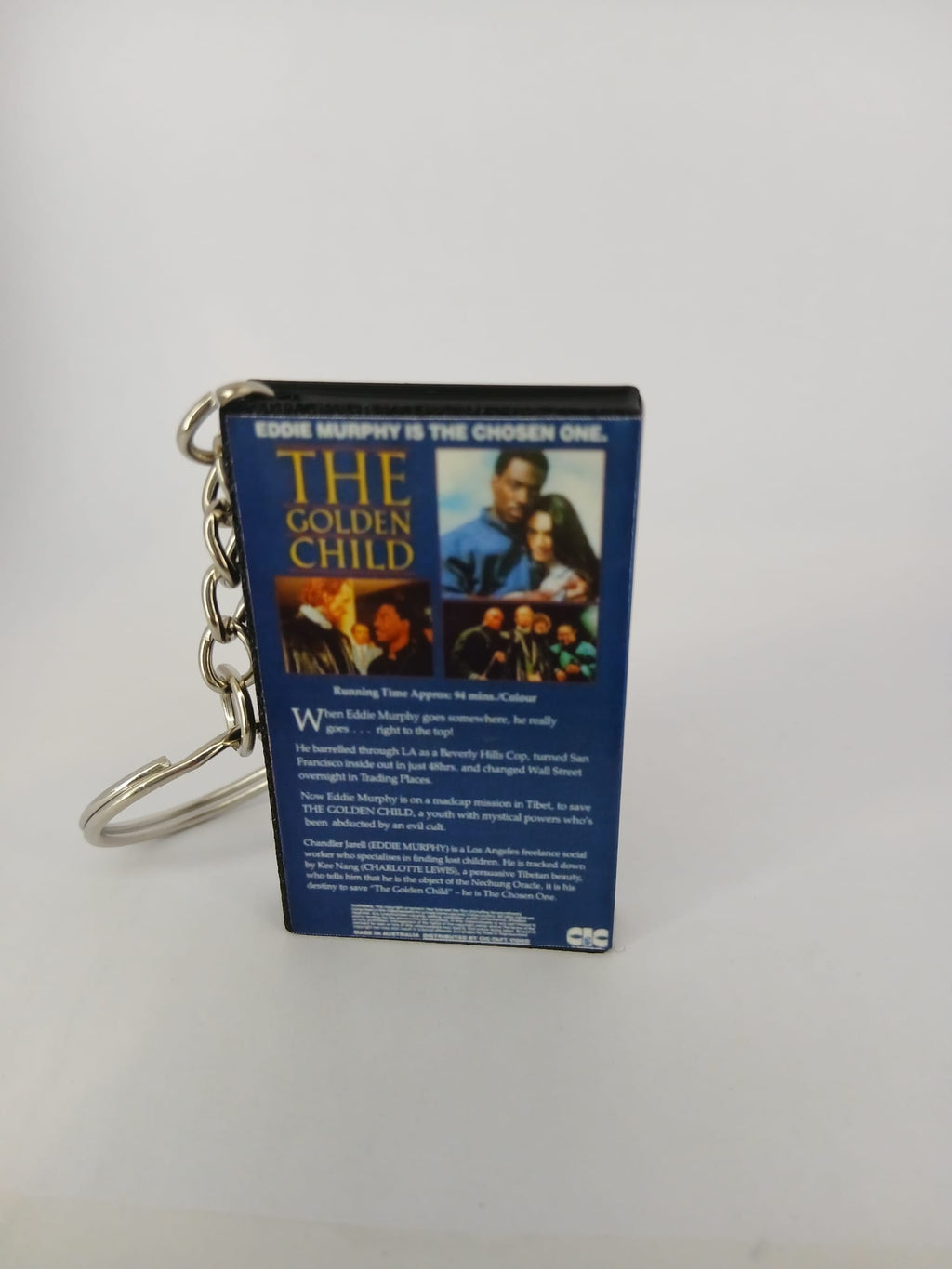 The Golden Child VHS keyring — flat lay front and spine angled