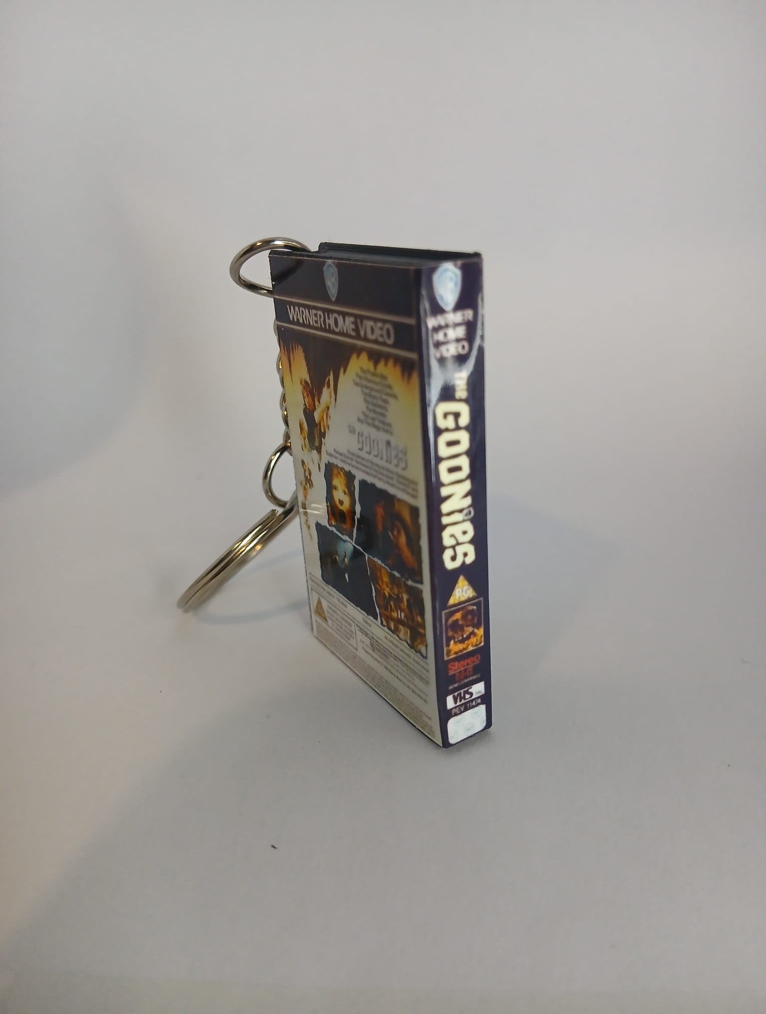 The Goonies VHS keyring — back cover standing angled 2