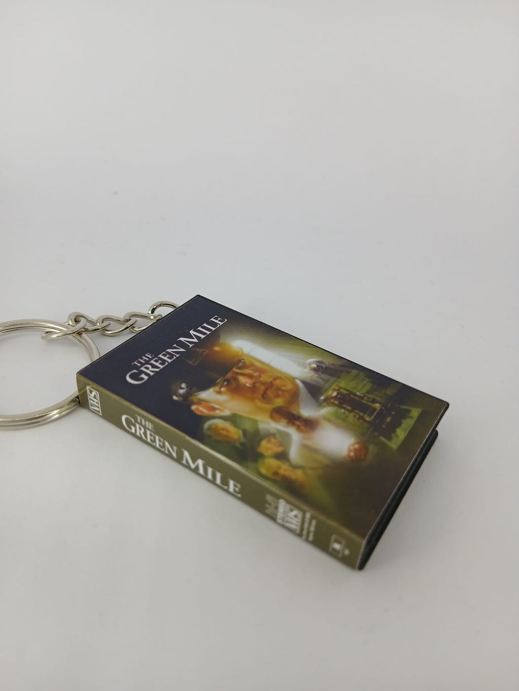 The Green Mile VHS keyring — front cover standing angled