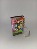 Hackers VHS keyring — back cover angled view standing
