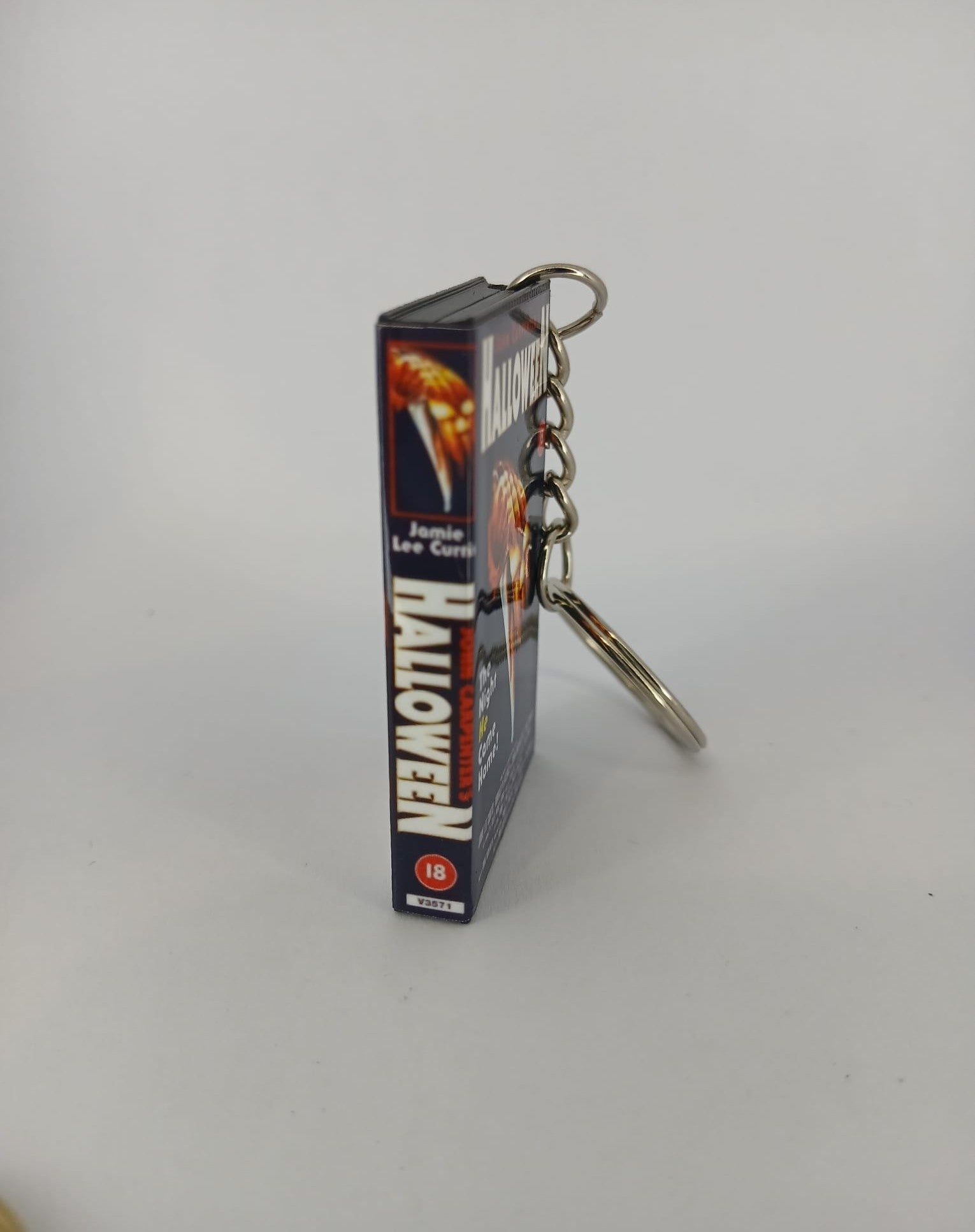 Halloween Mini VHS Keyring – back view standing