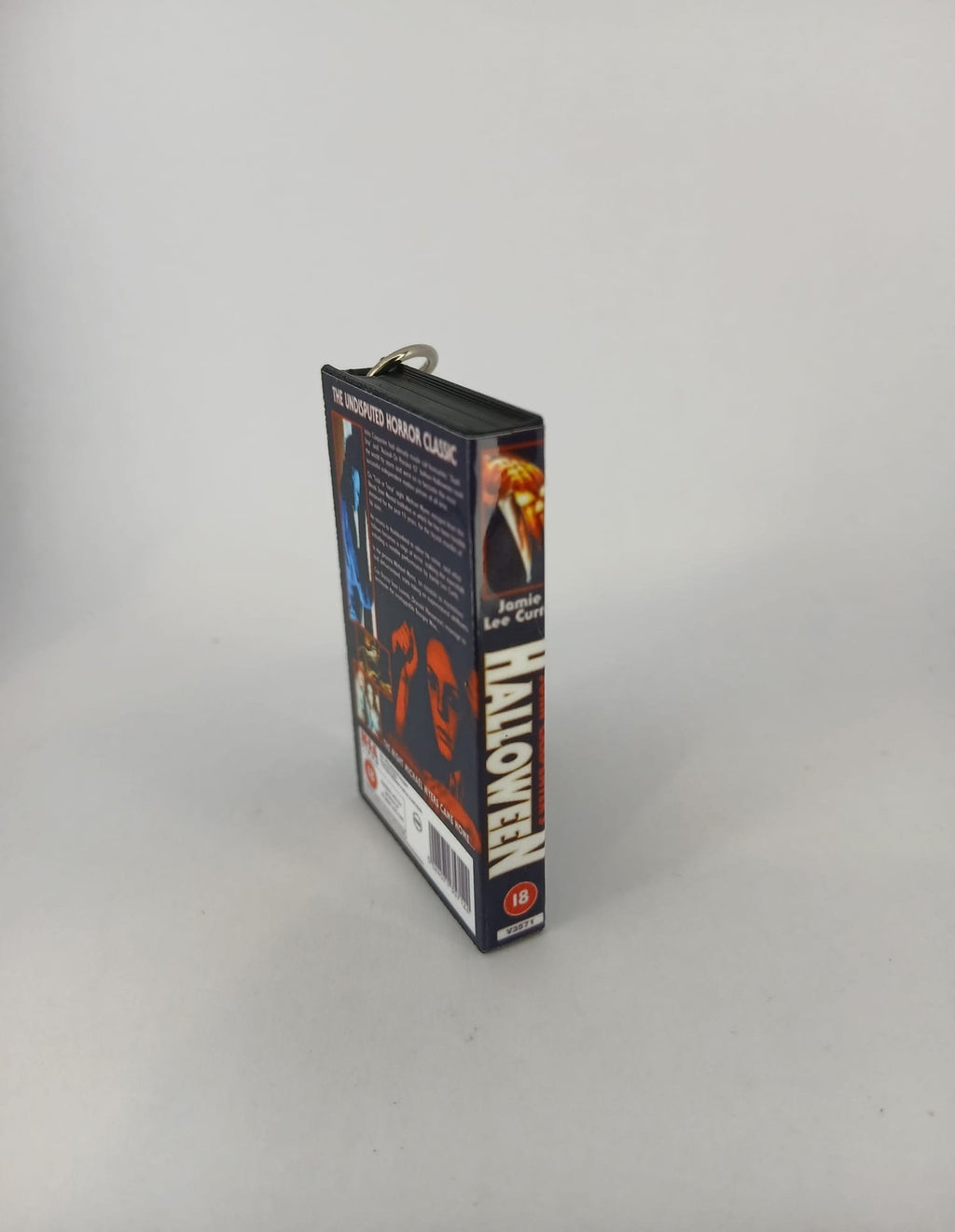 Halloween Mini VHS Keyring – flat lay overhead