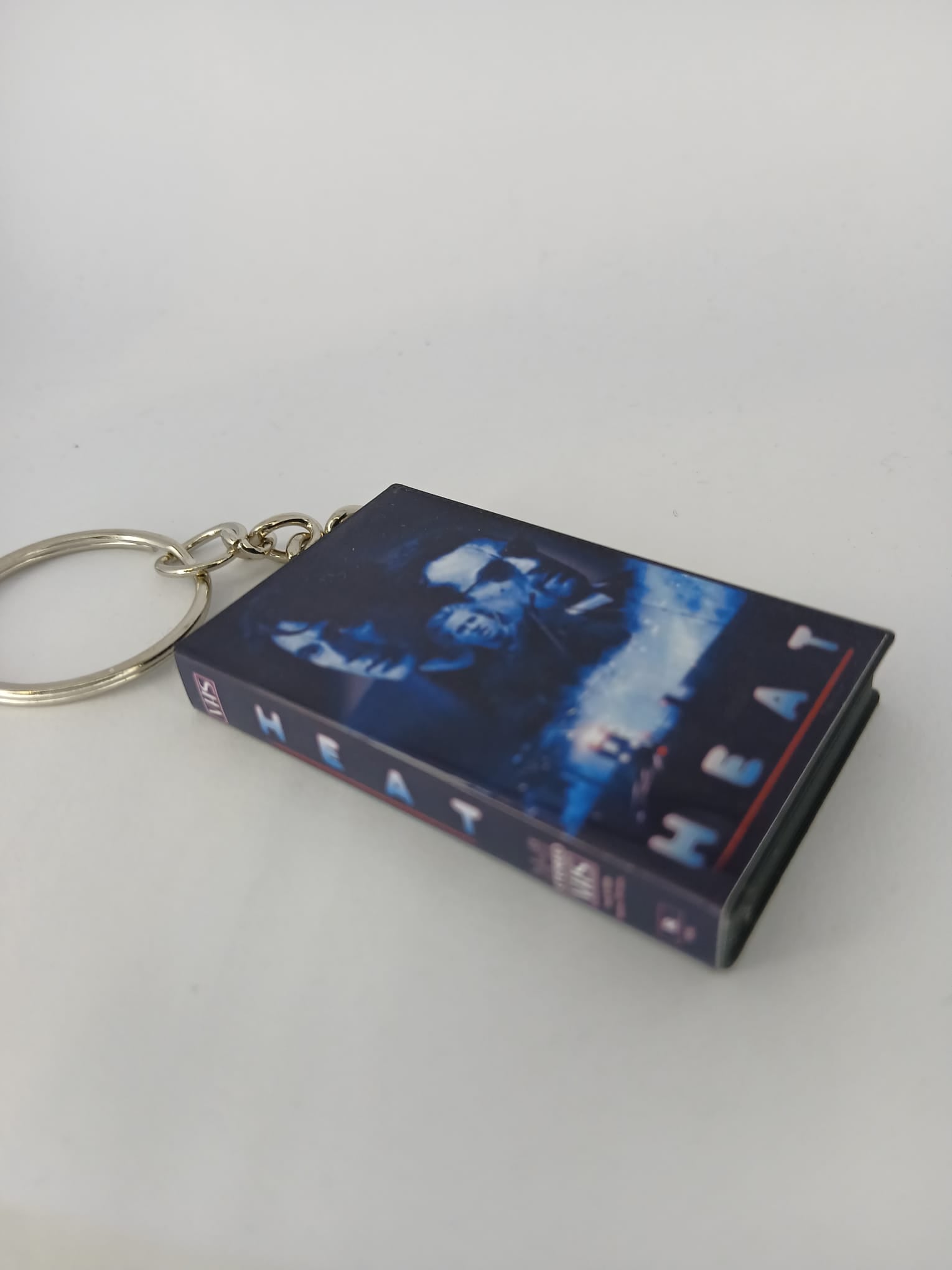 Heat VHS keyring spine view