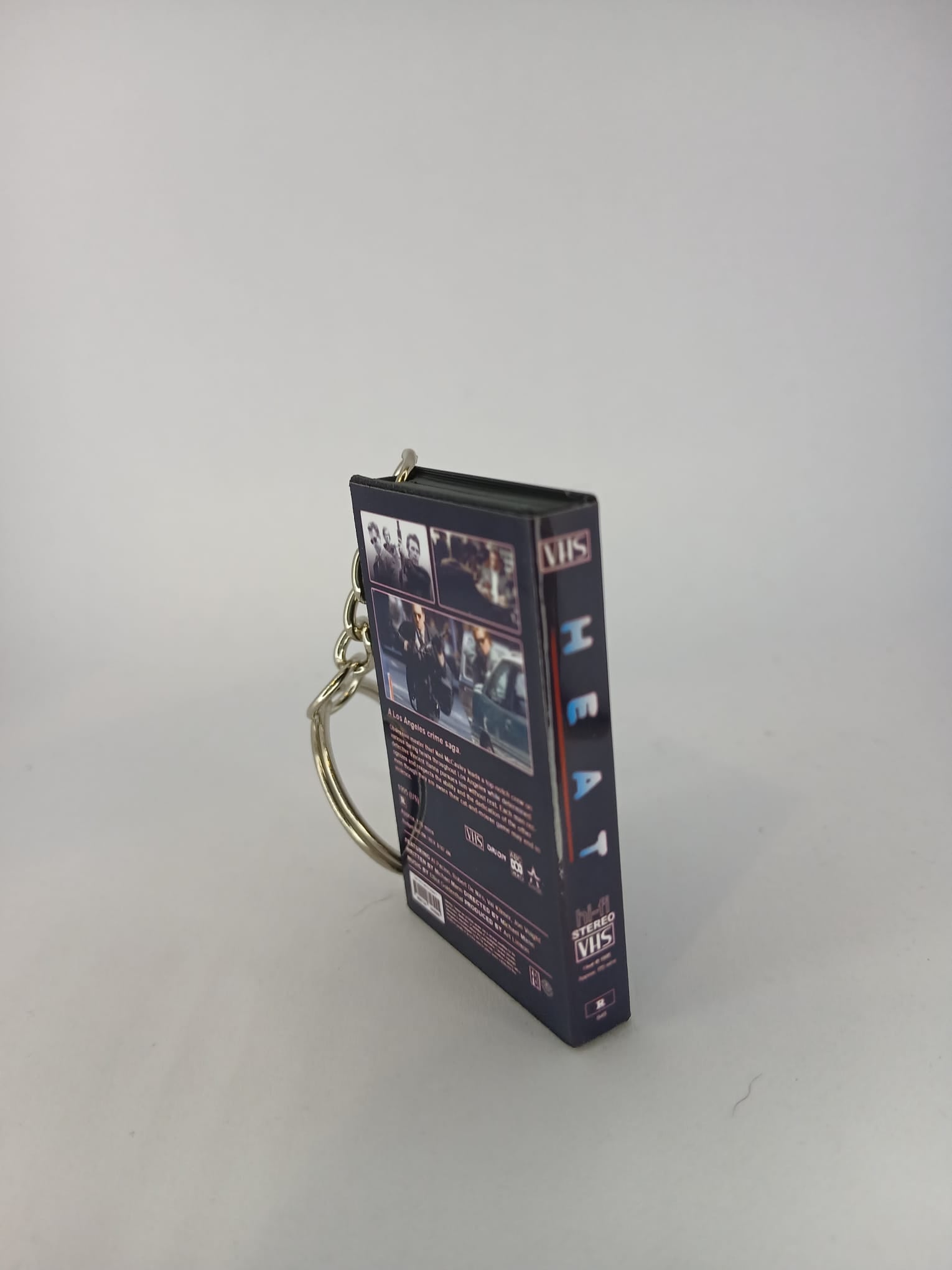 Heat VHS keyring standing upright