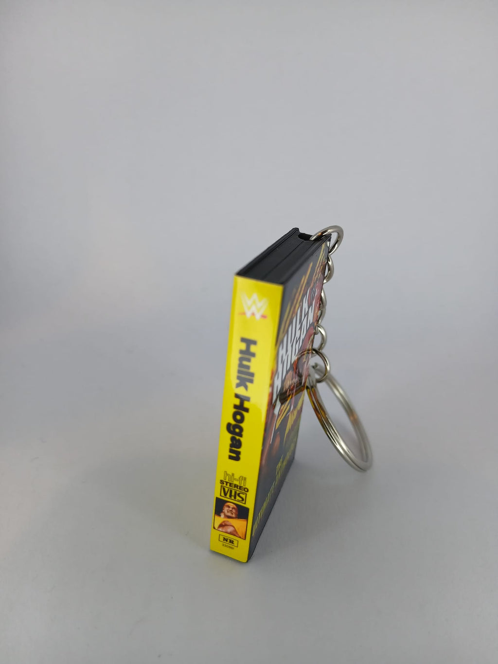 Hulk Hogan Ultimate Anthology VHS keyring — front cover standing angled