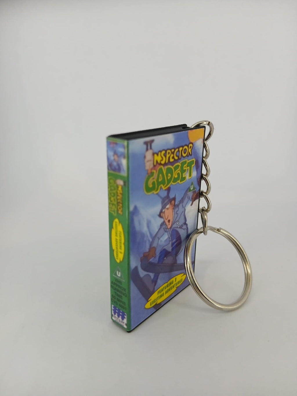 Inspector Gadget VHS keyring — back cover angled view standing
