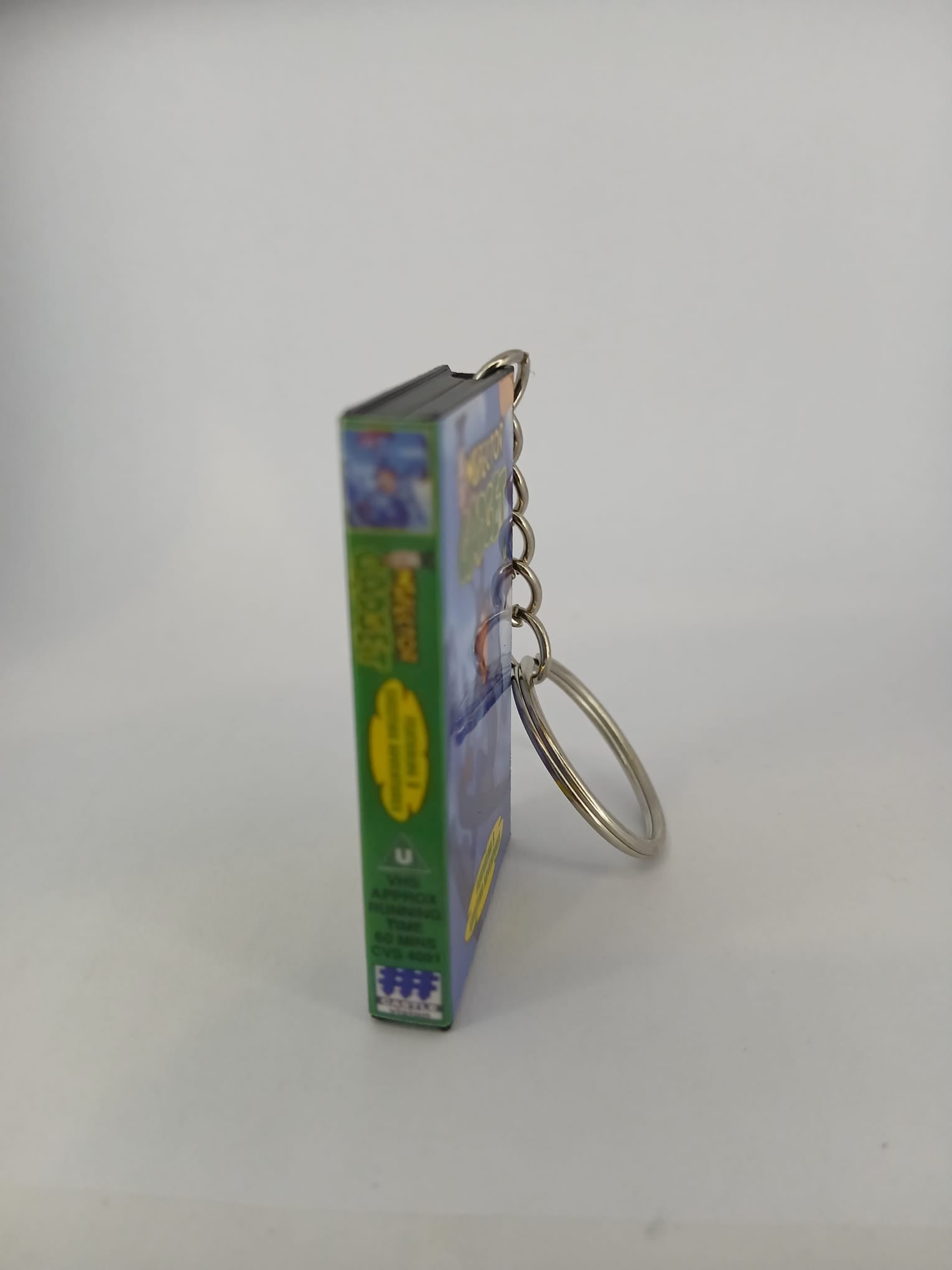 Inspector Gadget VHS keyring — front cover standing angled