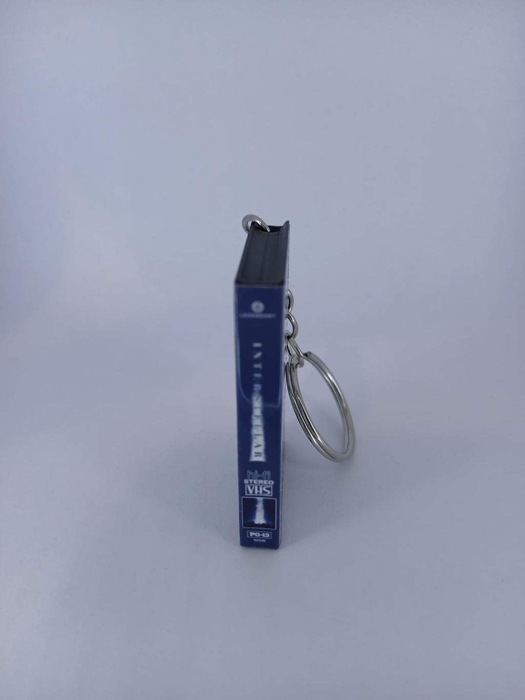 Interstellar VHS keyring — spine view