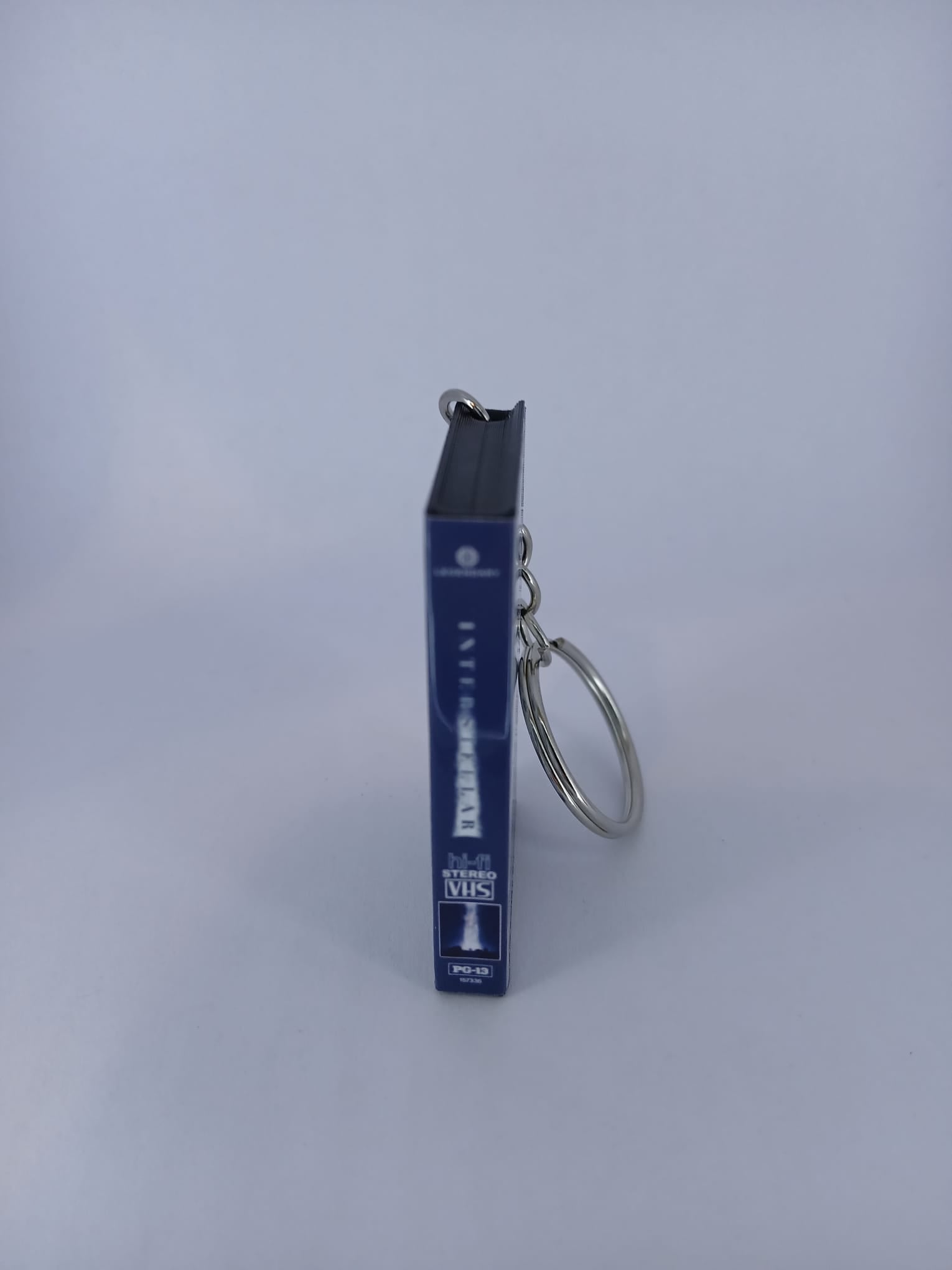 Interstellar VHS keyring — spine view