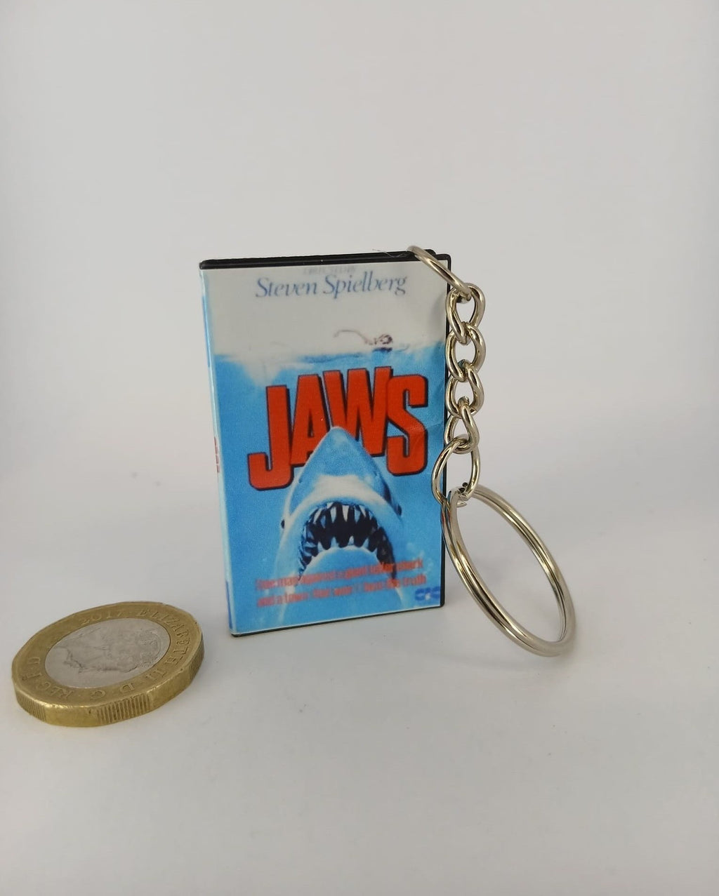 Jaws VHS keyring — flat lay front and spine angled