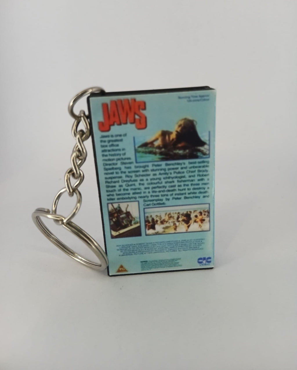 Jaws VHS keyring — front cover flat lay angled