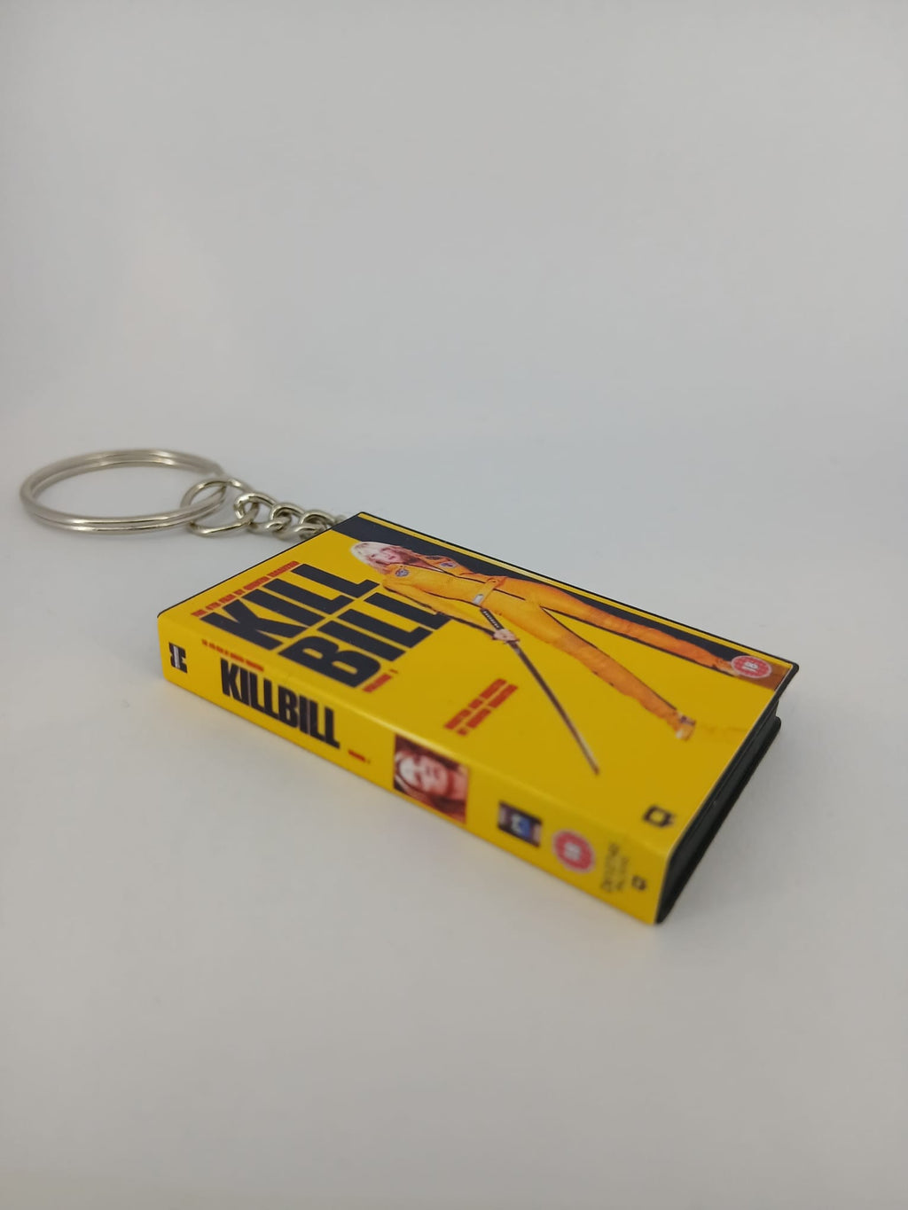 Kill Bill Volume 1 VHS keyring — back cover standing angled 2