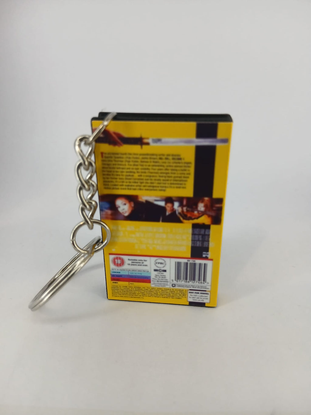 Kill Bill Volume 1 VHS keyring — front cover standing angled