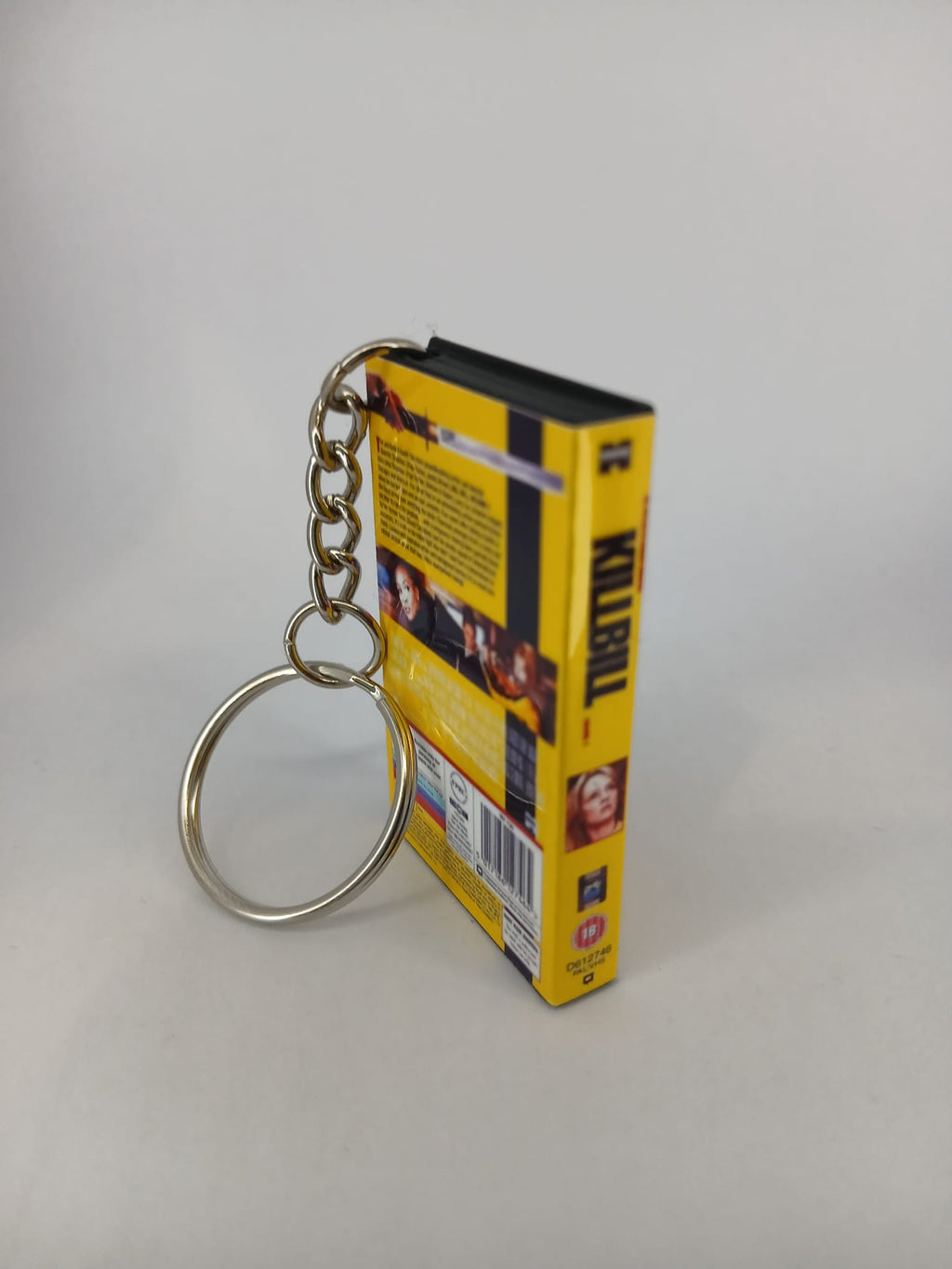 Kill Bill Volume 1 VHS keyring — front cover standing angled 2