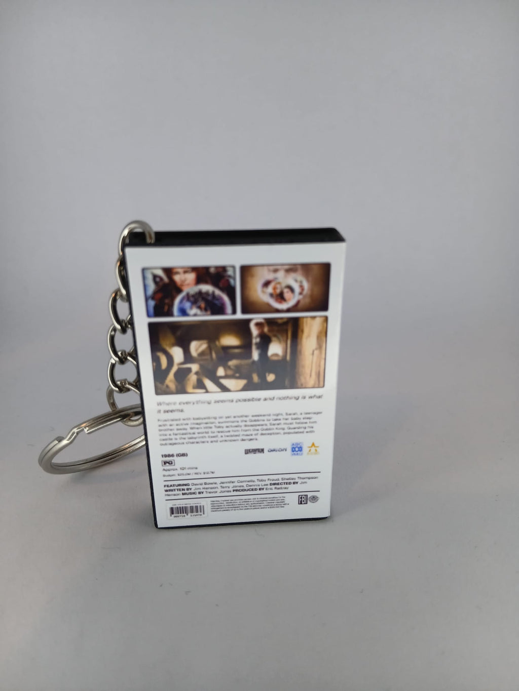 Labyrinth VHS keyring — back cover standing angled