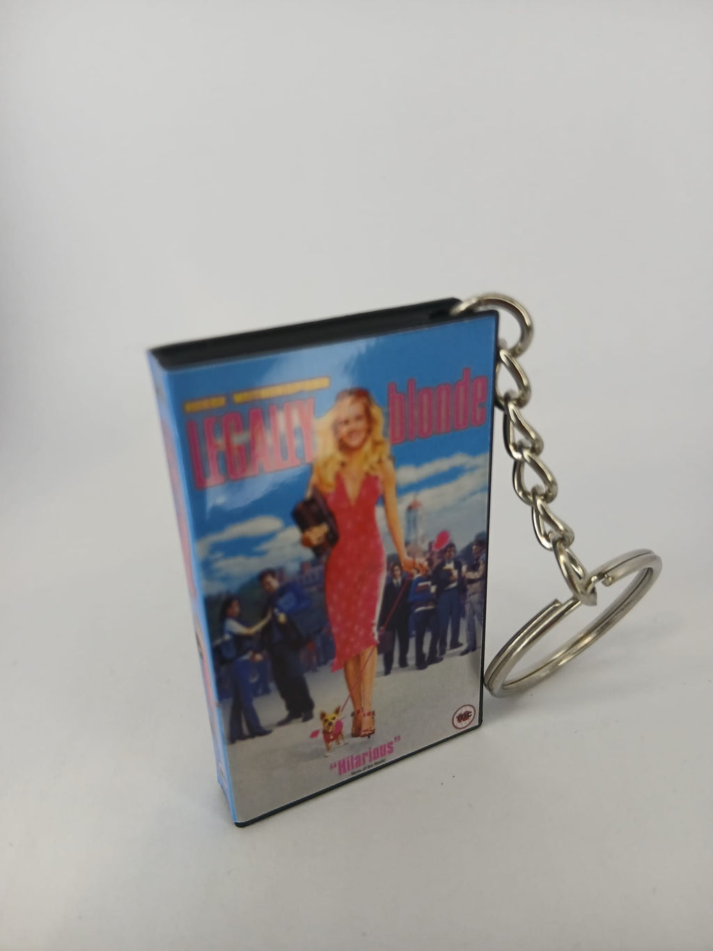 Legally Blonde VHS keyring — front cover with coin for scale
