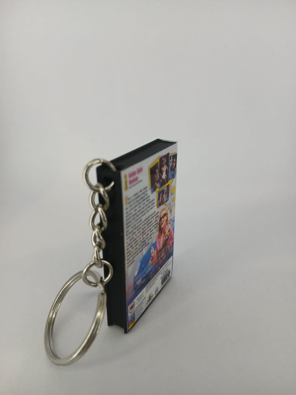 Legally Blonde VHS keyring — front cover flat lay angled