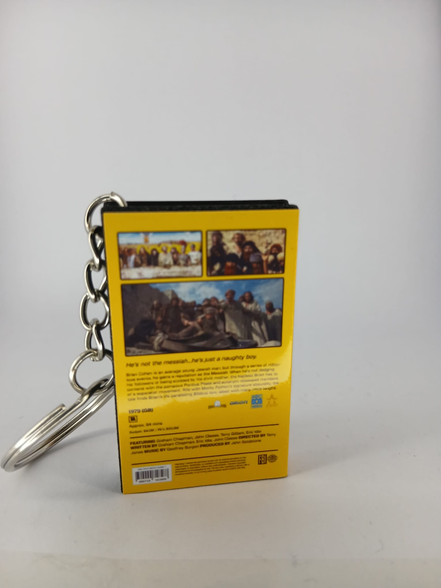 Monty Python's Life of Brian VHS keyring — spine and back angled view
