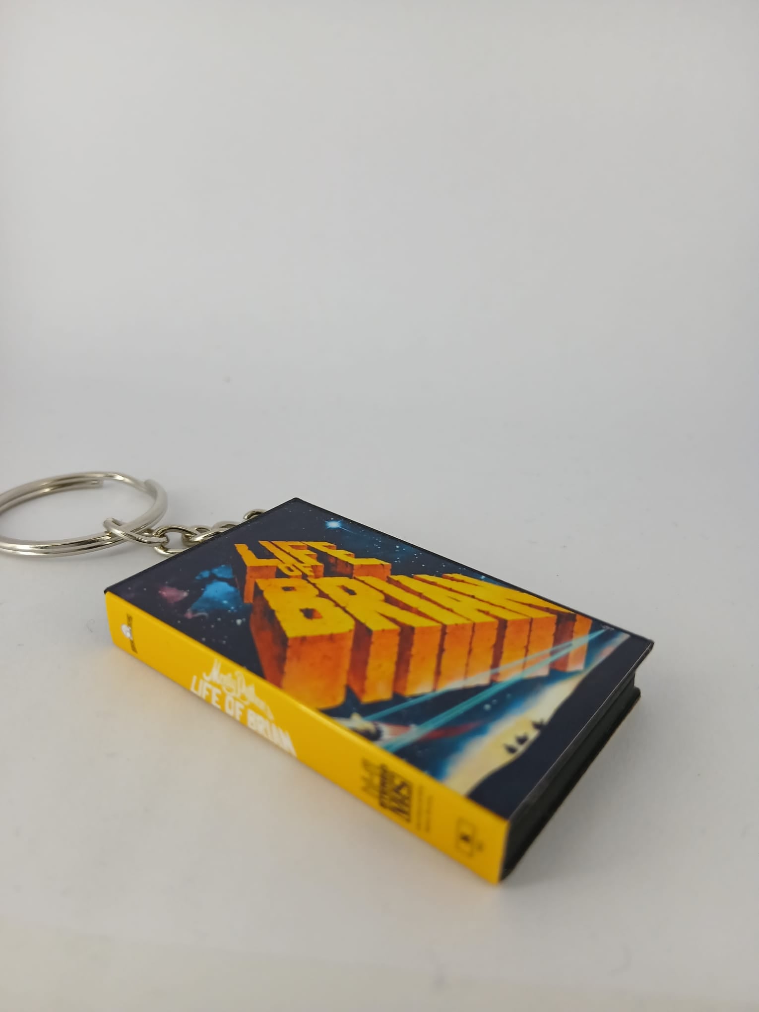Monty Python's Life of Brian VHS keyring — front cover standing