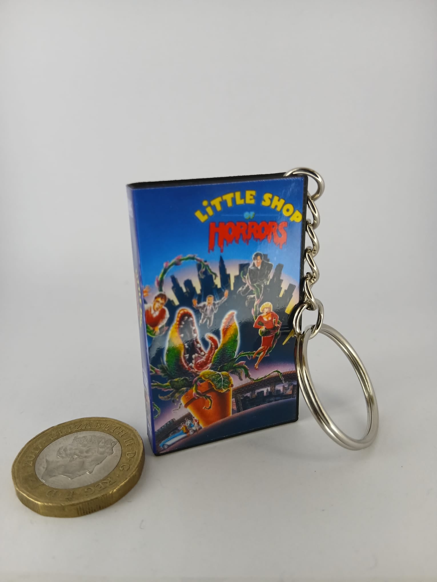Little Shop of Horrors VHS keyring — back cover standing angled