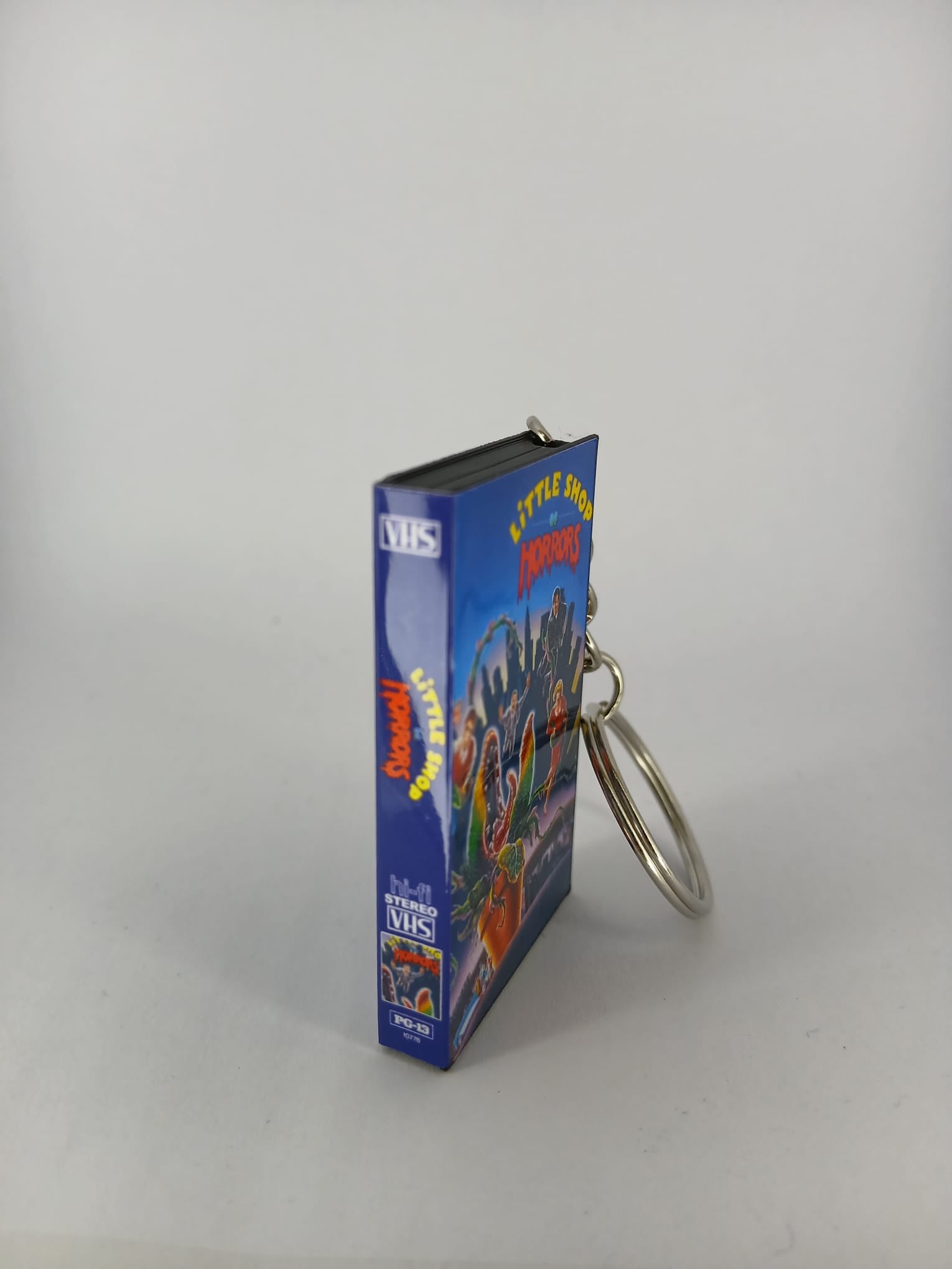 Little Shop of Horrors VHS keyring — front cover standing