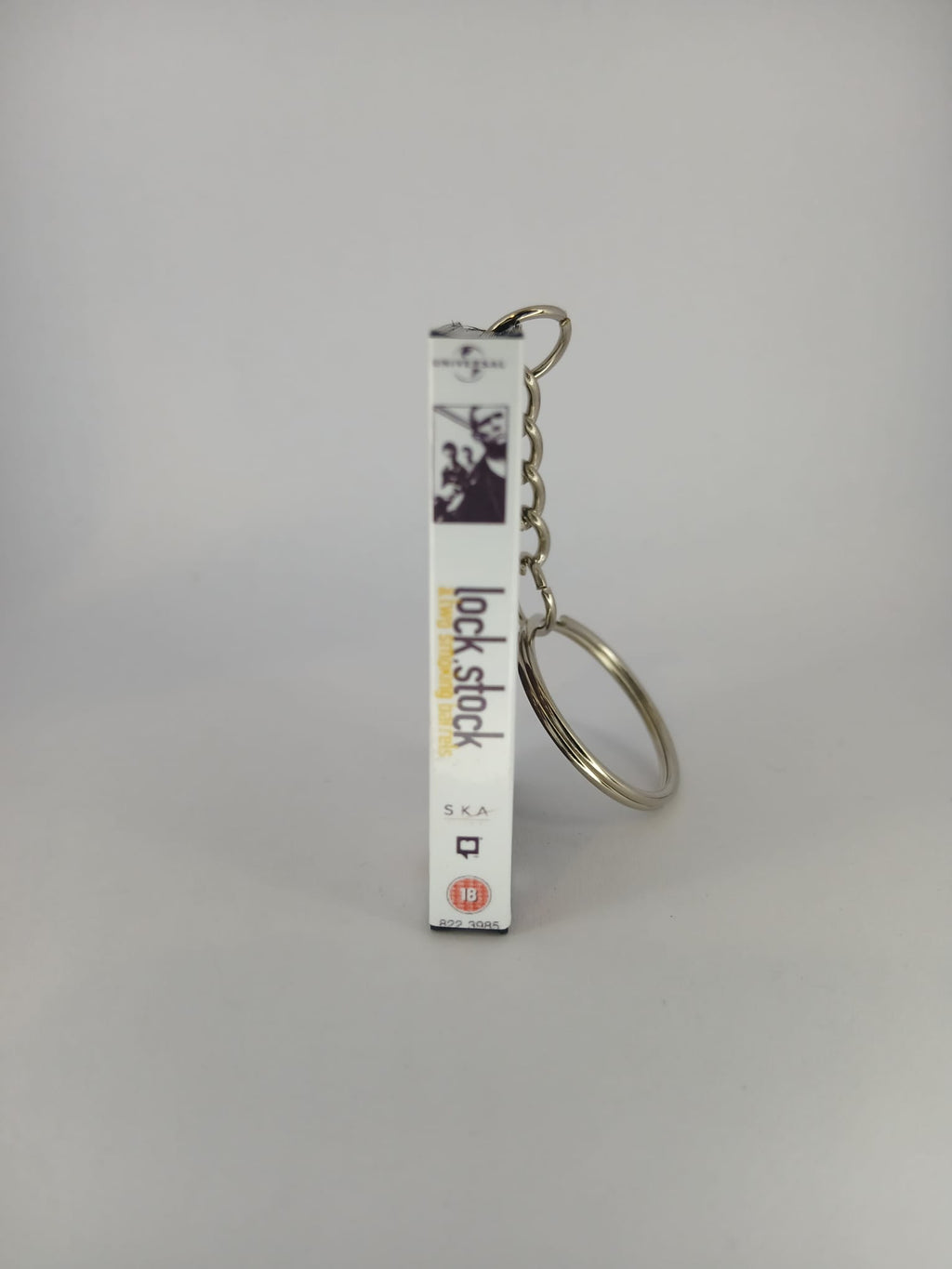 Lock, Stock and Two Smoking Barrels Mini VHS Keyring – back view standing