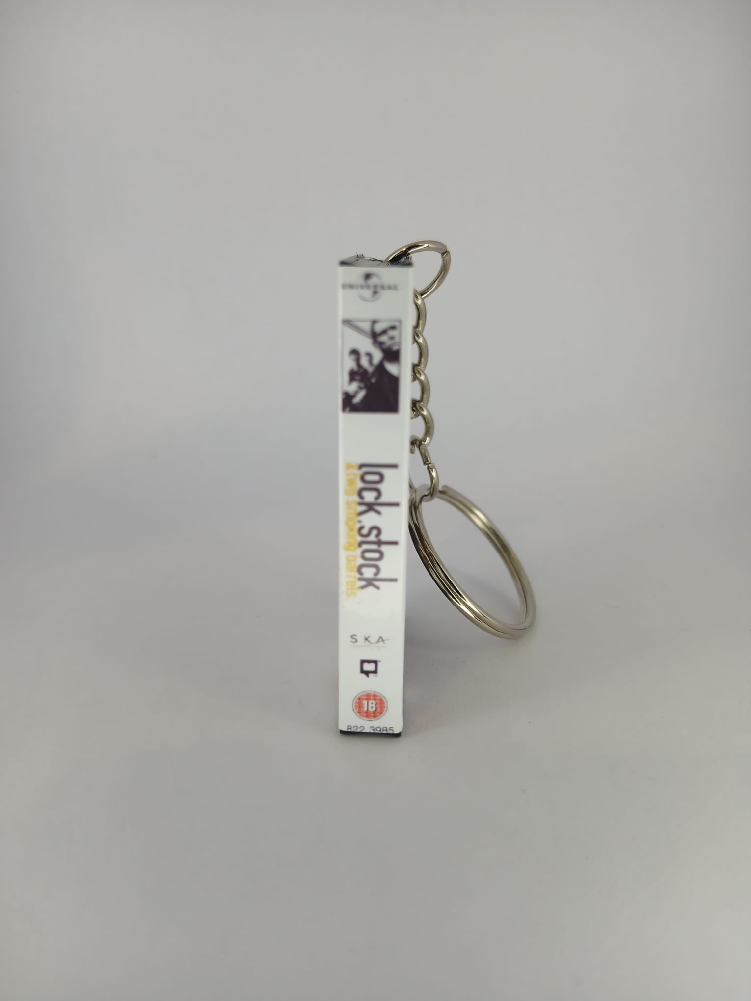 Lock, Stock and Two Smoking Barrels Mini VHS Keyring – back view standing