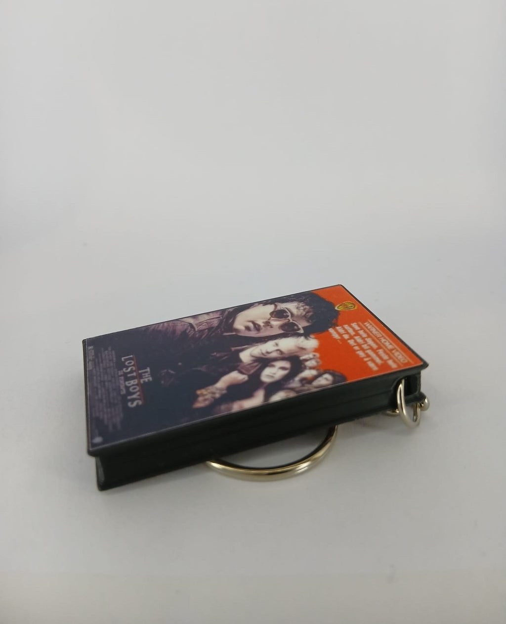 The Lost Boys VHS keyring angle view