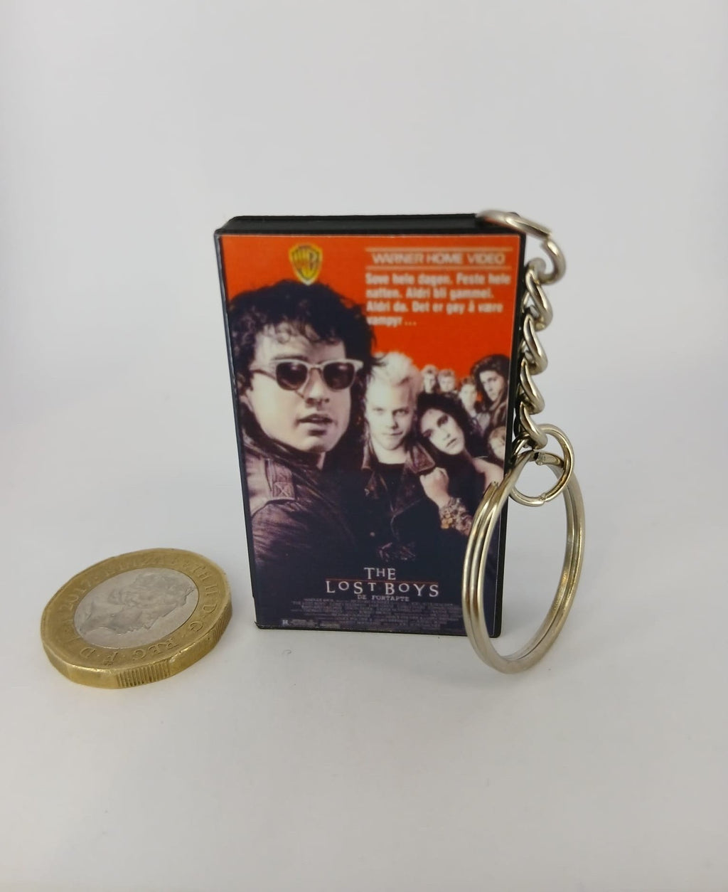 The Lost Boys VHS keyring size comparison with coin