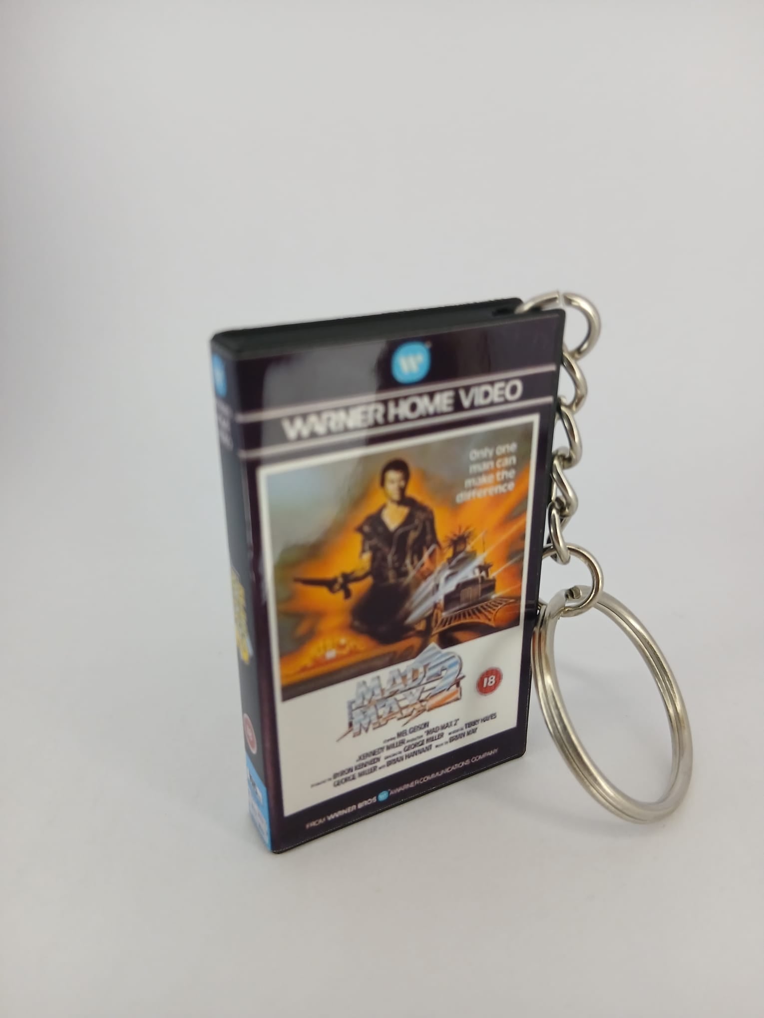 Mad Max 2 VHS keyring — front cover standing angled 3