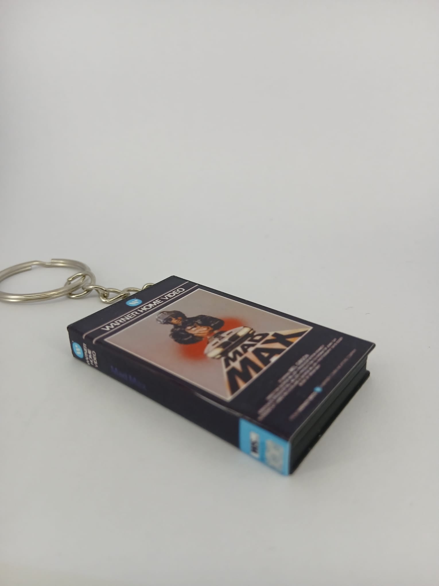 Mad Max VHS keyring — front cover standing angled 2