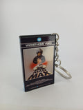 Mad Max VHS keyring — front and spine angled view standing