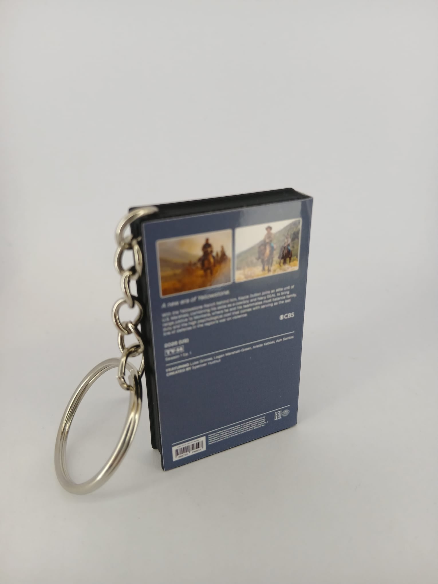 Marshals: A Yellowstone Story VHS keyring — front cover standing angled
