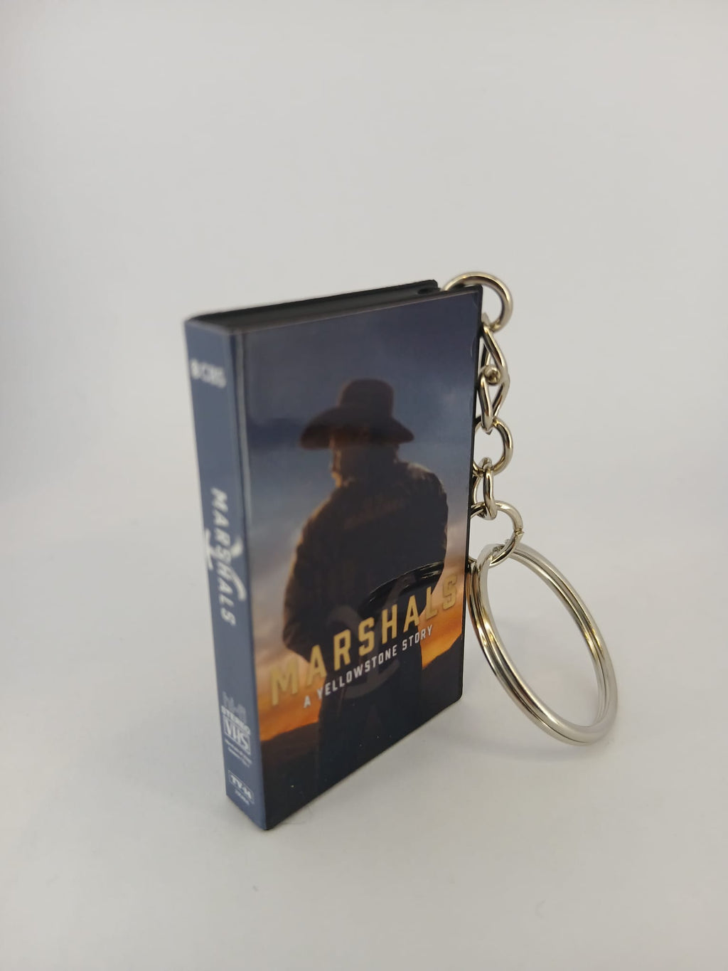 Marshals: A Yellowstone Story VHS keyring — back cover standing angled