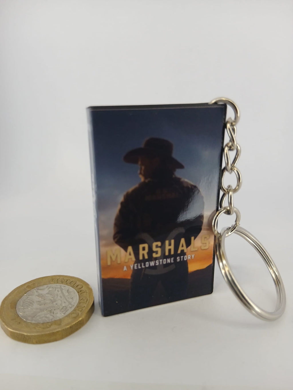 Marshals: A Yellowstone Story VHS keyring — spine view standing
