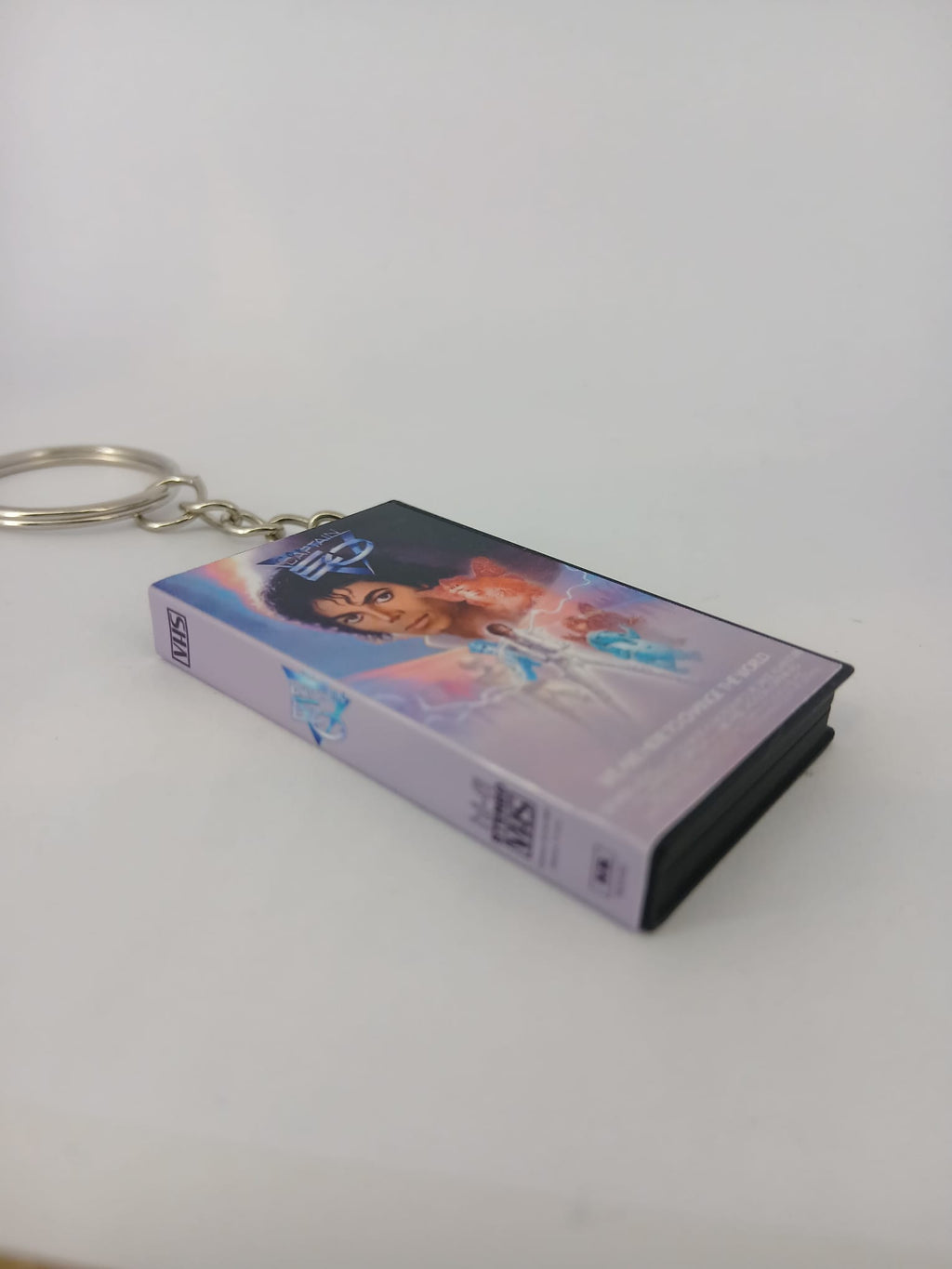 Captain EO VHS keyring — front cover standing angled 2