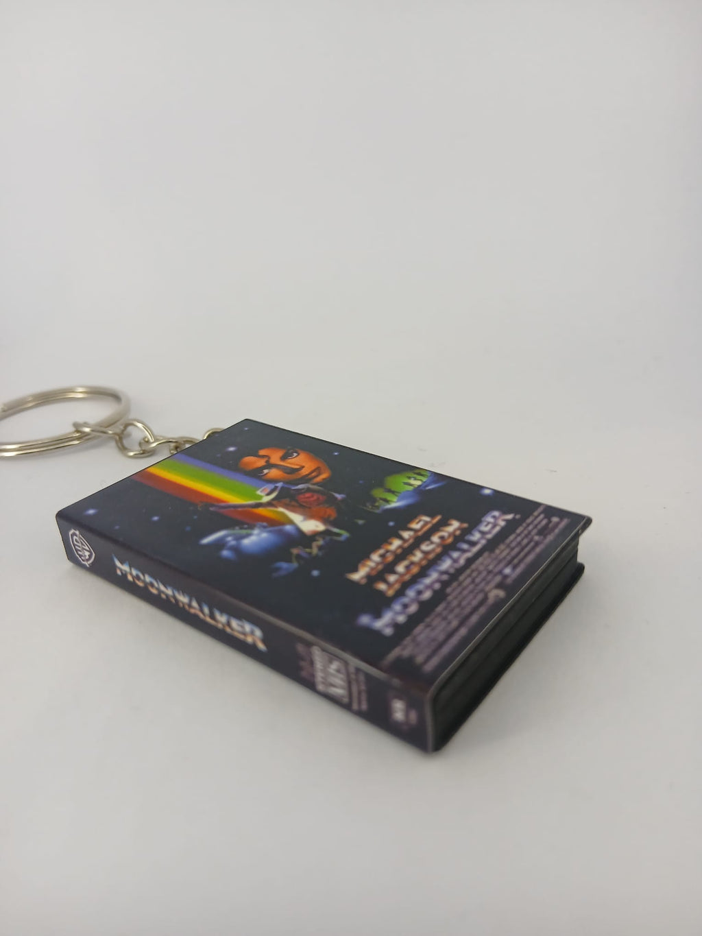 Moonwalker VHS keyring — spine view standing